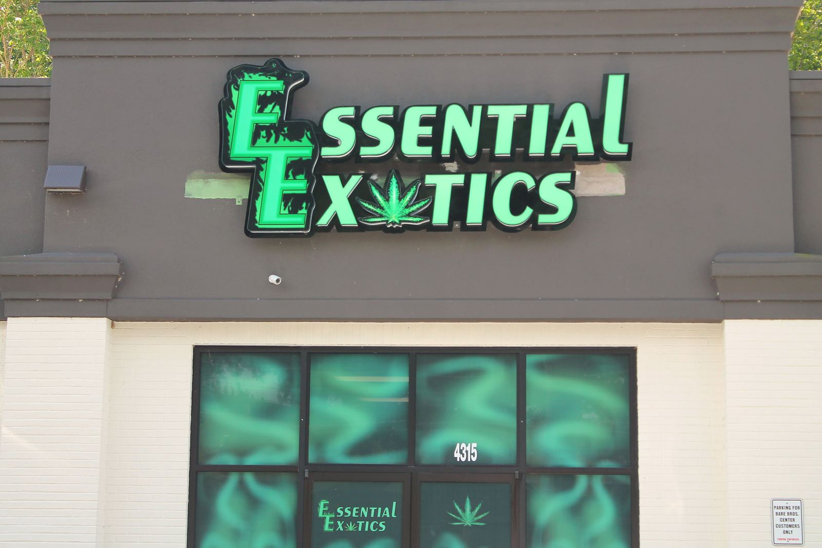 Essential Exotics storefront sign